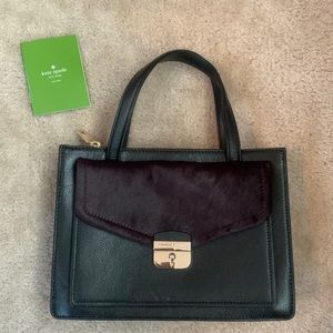 Black Kate spade purse with dark purple cow skin